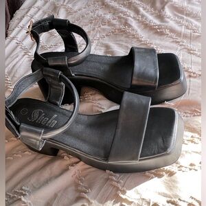 Edgy platform black heel